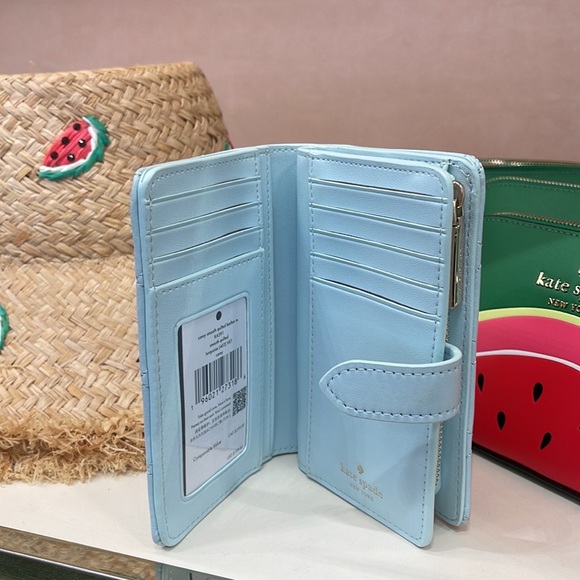 Kate Spade Carey Medium Compartment Bifold Wallet
COLOR: Turquoise
NWT - Picture 12 of 16